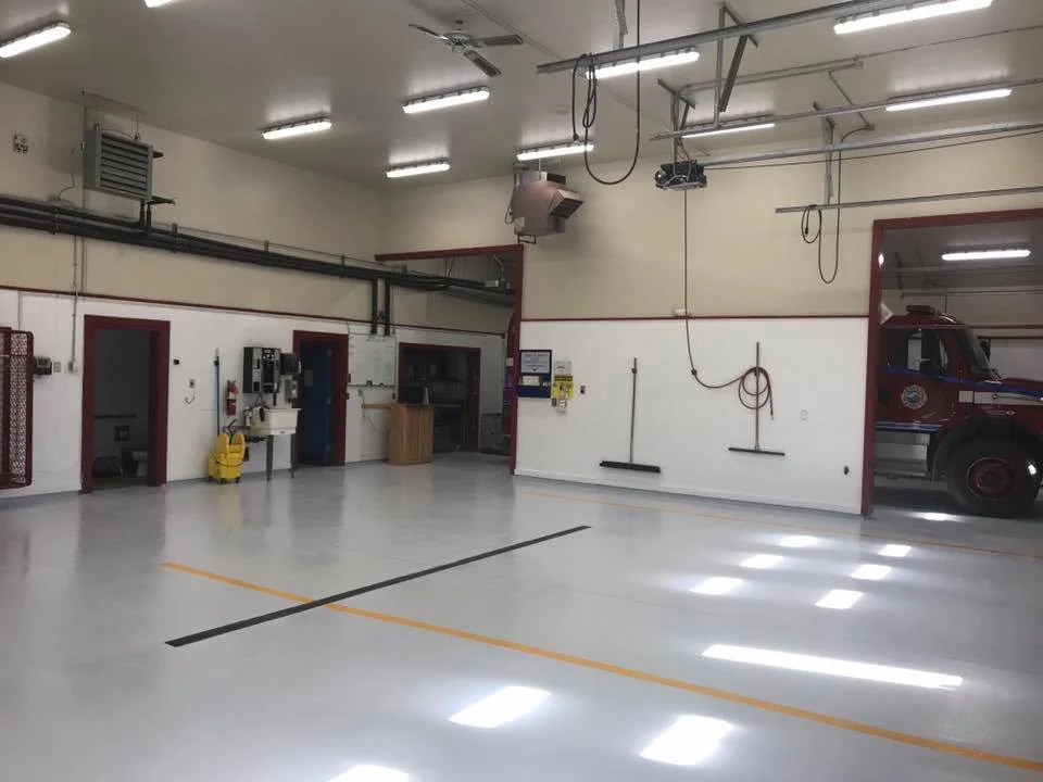 Interior commercial painting by JNL; floor-coating scope not confirmed.
